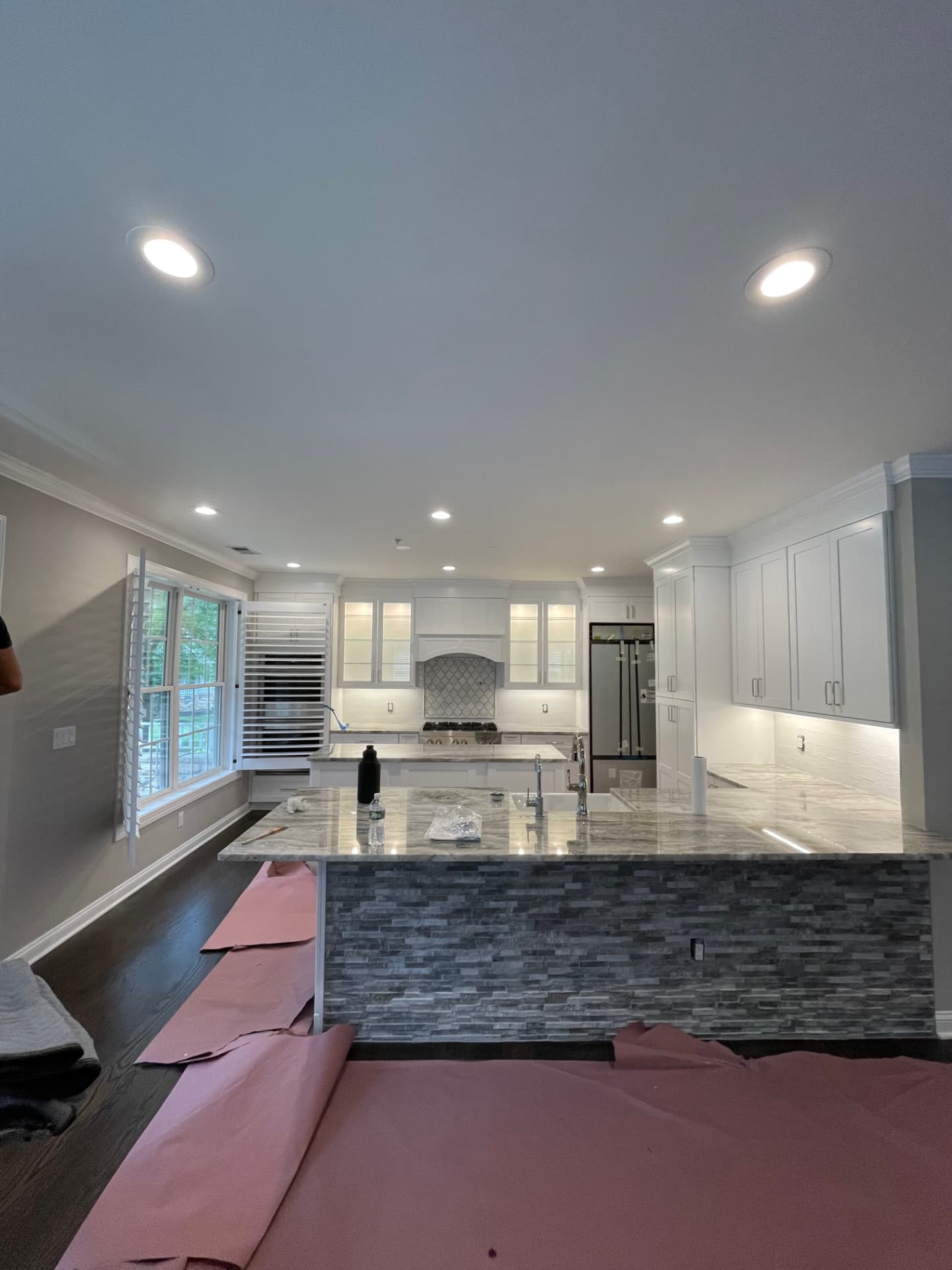 Painted open-plan living room and kitchen