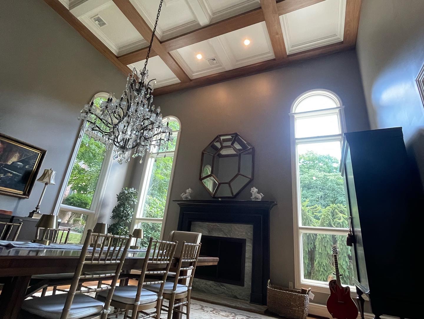 Dining room with detailed ceiling and painted walls