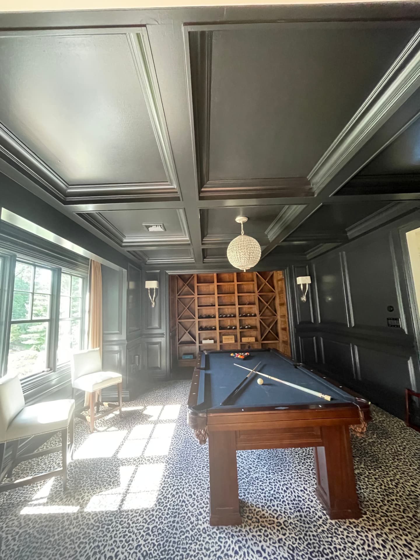 Painted room with coffered ceiling and pool table